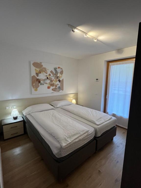 Postel nebo postele na pokoji v ubytování Appartamenti Home Service