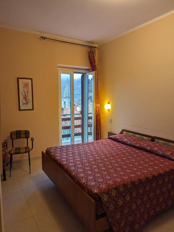 Postel nebo postele na pokoji v ubytování Albergo Seggiovia