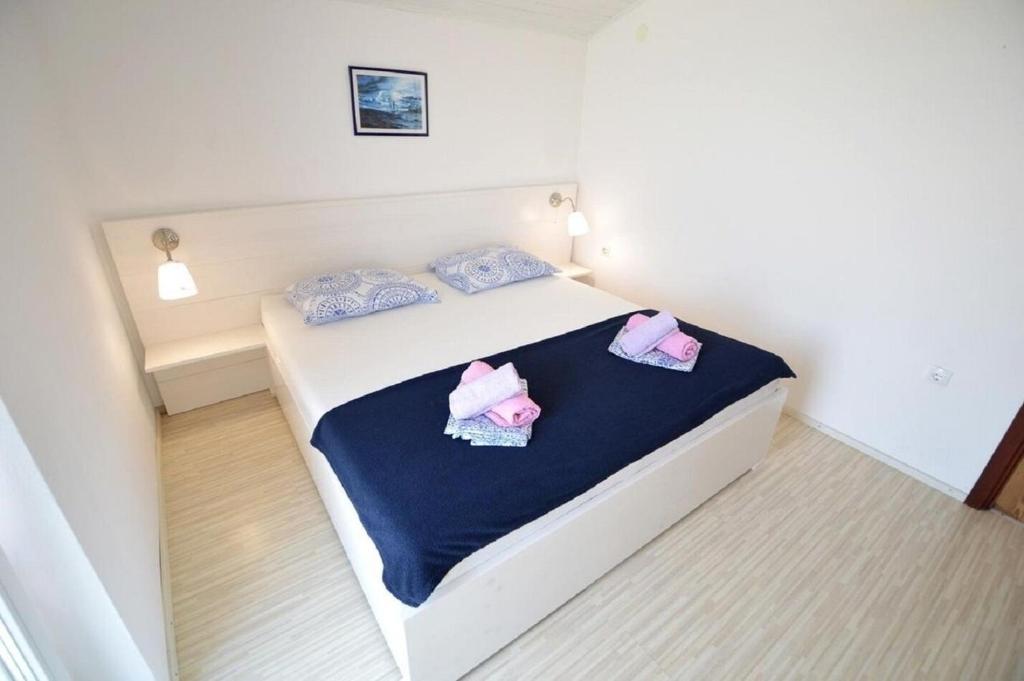 Posteľ alebo postele v izbe v ubytovaní Apartment Denko