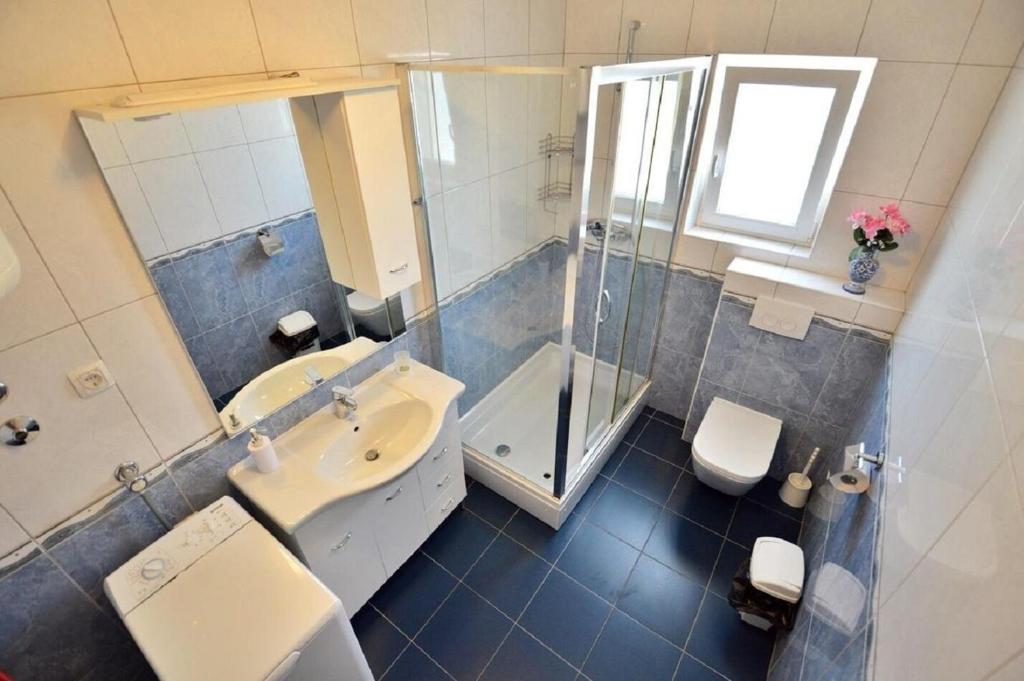 Kúpeľňa v ubytovaní Apartment Denko