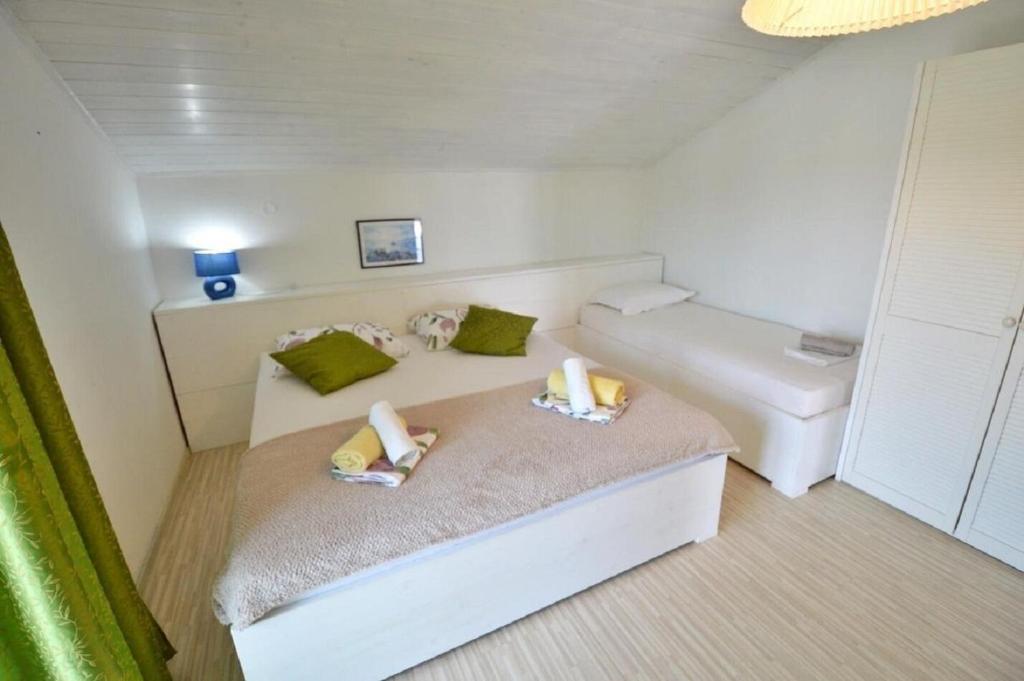 Posteľ alebo postele v izbe v ubytovaní Apartment Denko