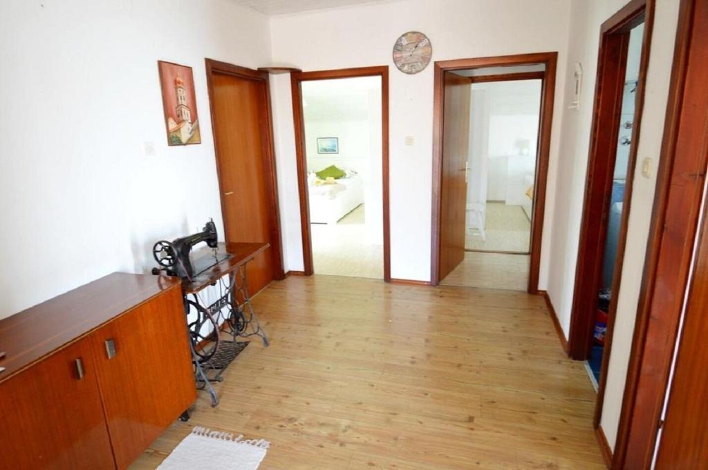 Televízia a/alebo spoločenská miestnosť v ubytovaní Apartment Denko