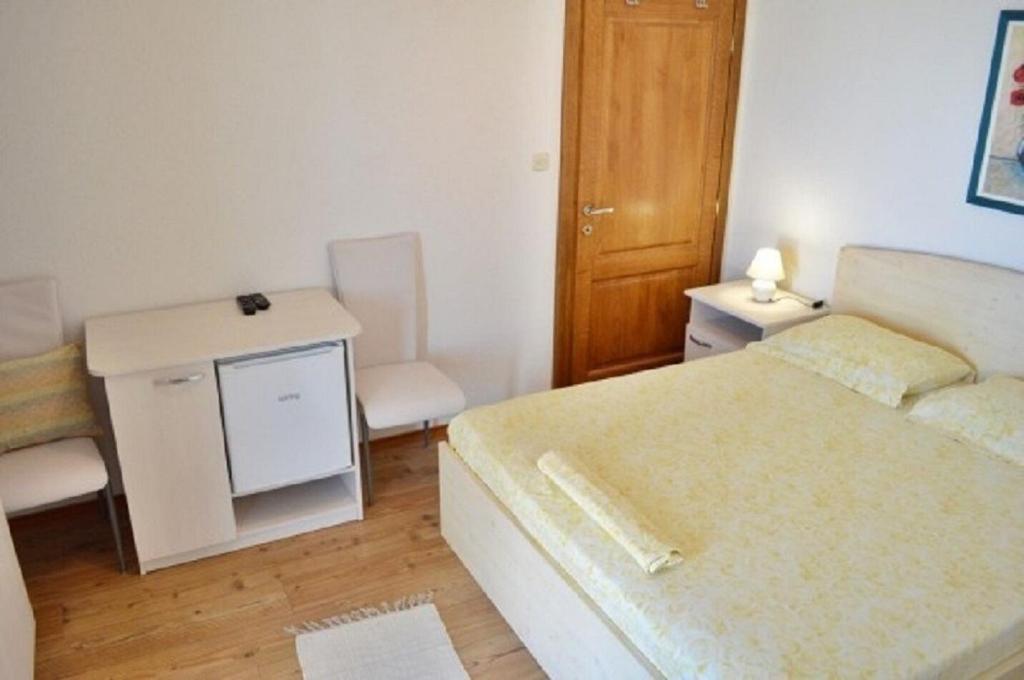 Posteľ alebo postele v izbe v ubytovaní Apartment Denko