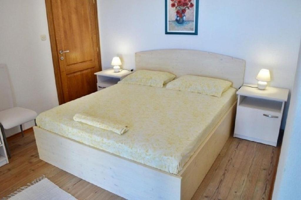 Posteľ alebo postele v izbe v ubytovaní Apartment Denko