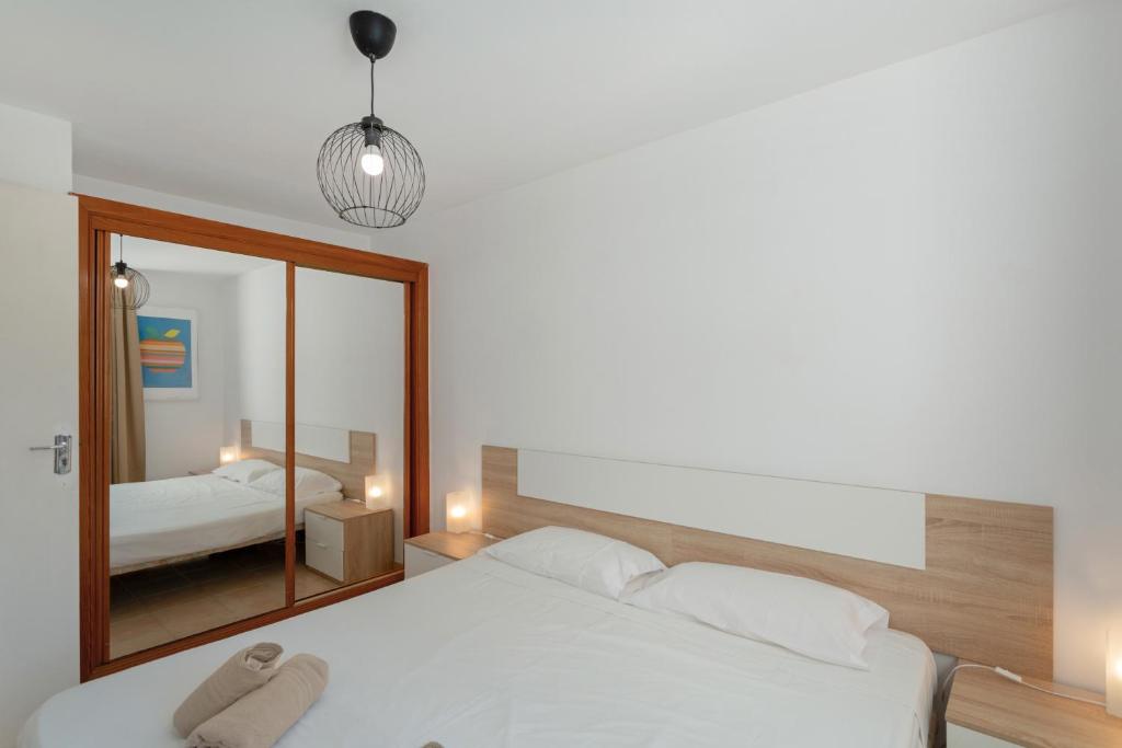 Postel nebo postele na pokoji v ubytování Apartamento Yumbo Centro