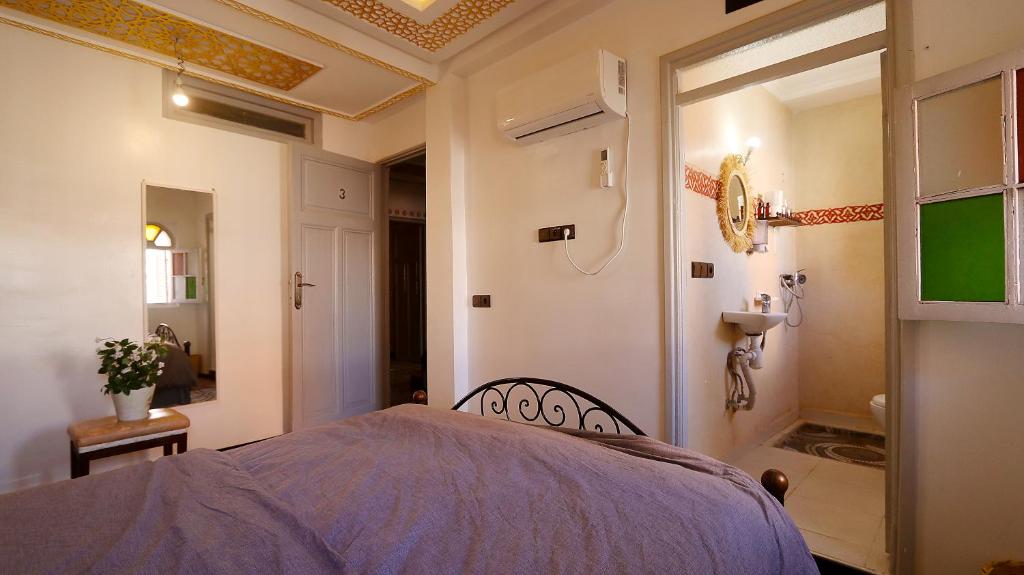 Postel nebo postele na pokoji v ubytování Araf House