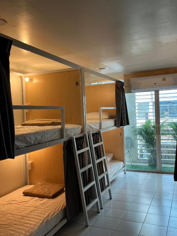 Postel nebo postele na pokoji v ubytování Mawa Anle Hostel