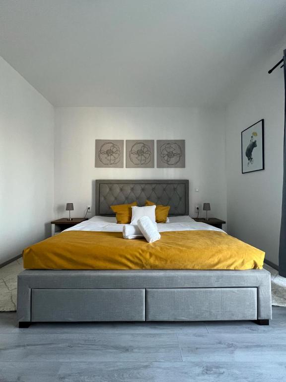 Postel nebo postele na pokoji v ubytování Harmonia Riva Apartmán B11