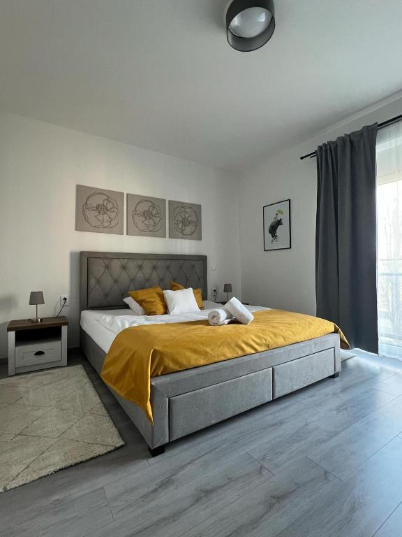 Postel nebo postele na pokoji v ubytování Harmonia Riva Apartmán B11