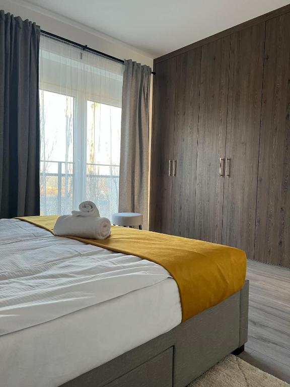 Postel nebo postele na pokoji v ubytování Harmonia Riva Apartmán B11