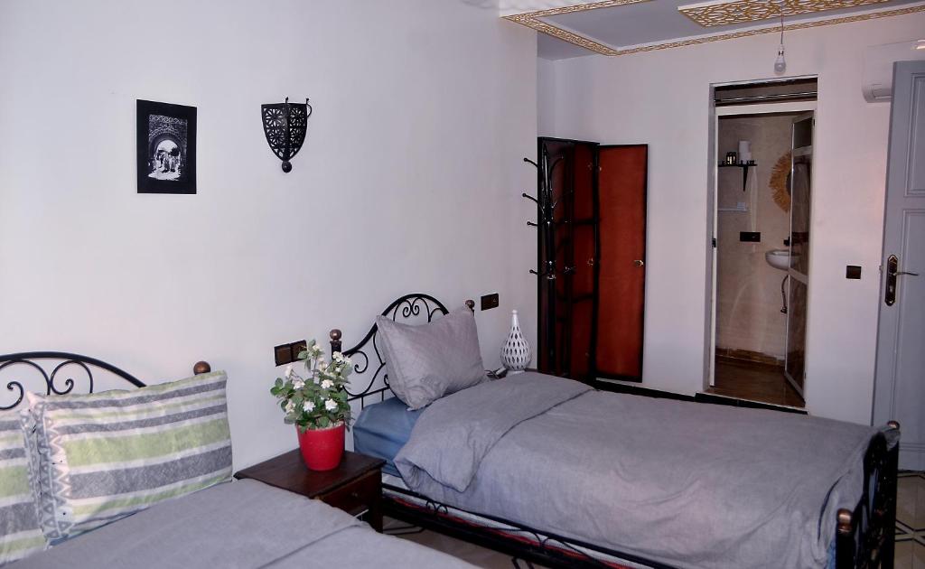 Postel nebo postele na pokoji v ubytování Araf House