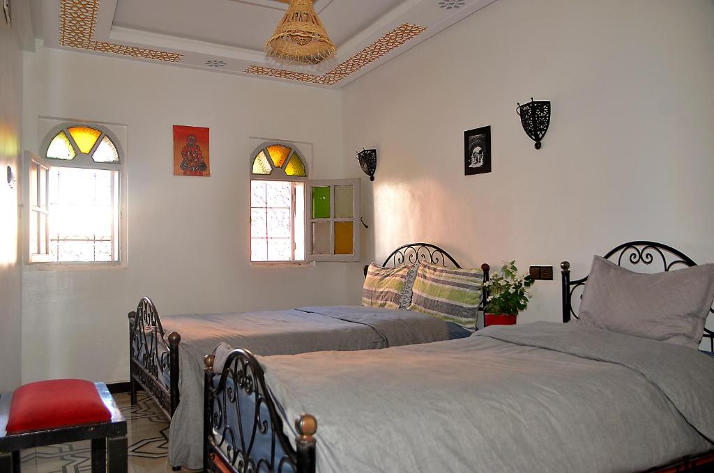 Postel nebo postele na pokoji v ubytování Araf House
