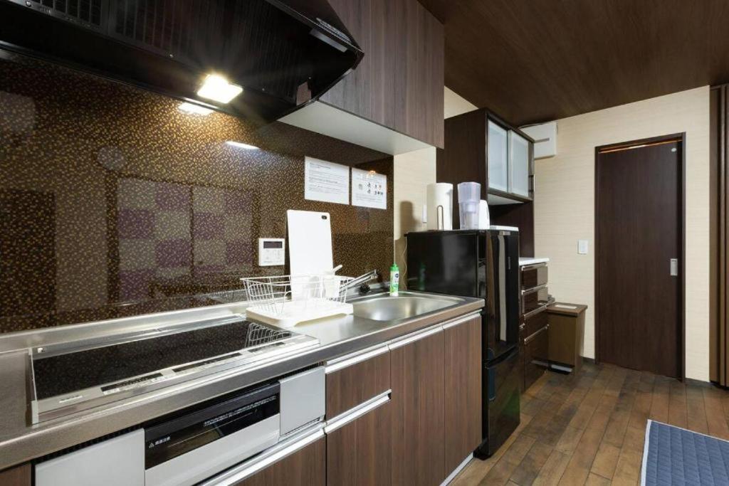 Kuchyň nebo kuchyňský kout v ubytování Daisenji Lodge Ing