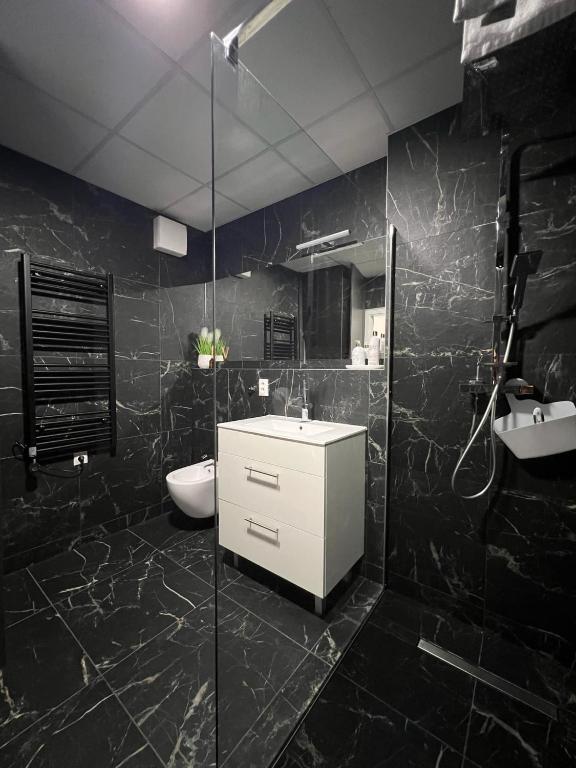 Koupelna v ubytování Harmonia Riva Apartmán B11