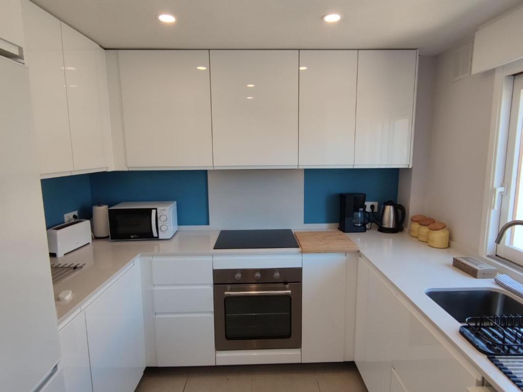 A kitchen or kitchenette at Apartment San Esteban-1 by Interhome