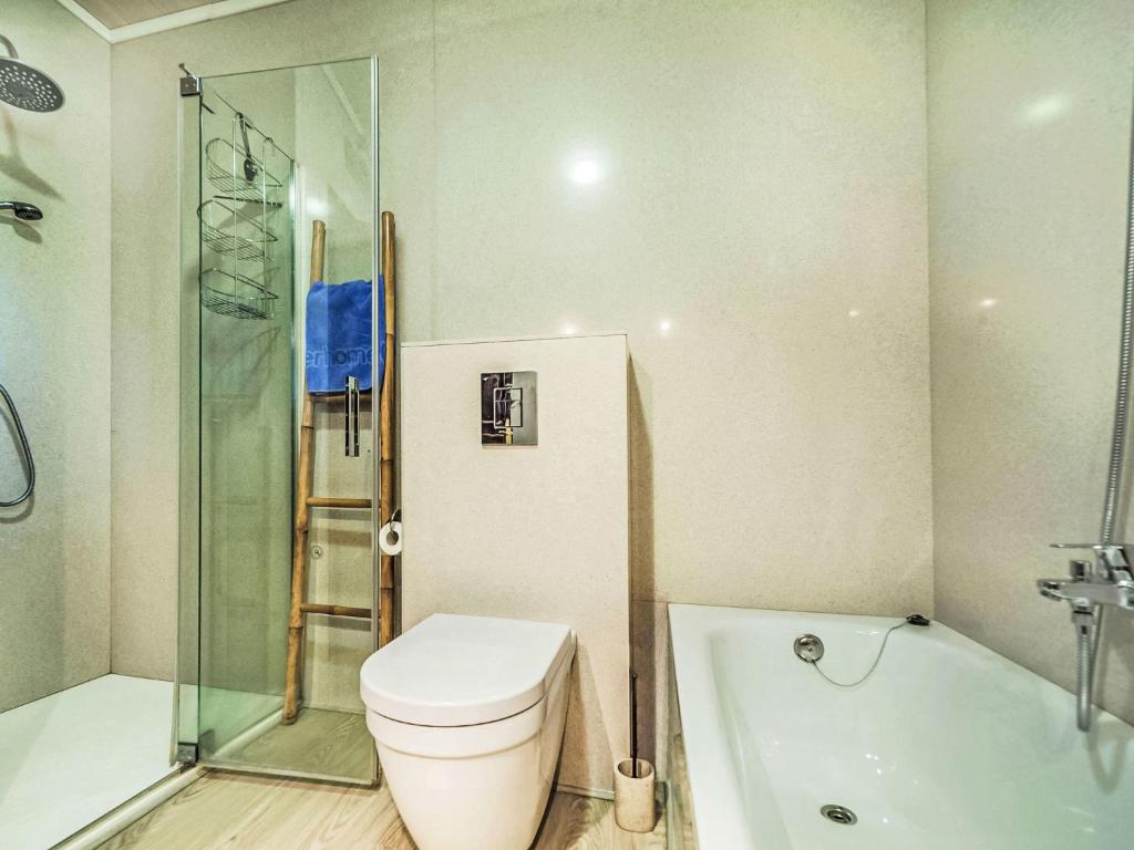 Koupelna v ubytování Holiday Home Puig Romani-1 by Interhome