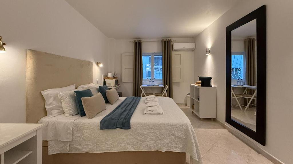 Ένα ή περισσότερα κρεβάτια σε δωμάτιο στο Sofeelings Quarto Praia Piso 1, Baixa de Albufeira