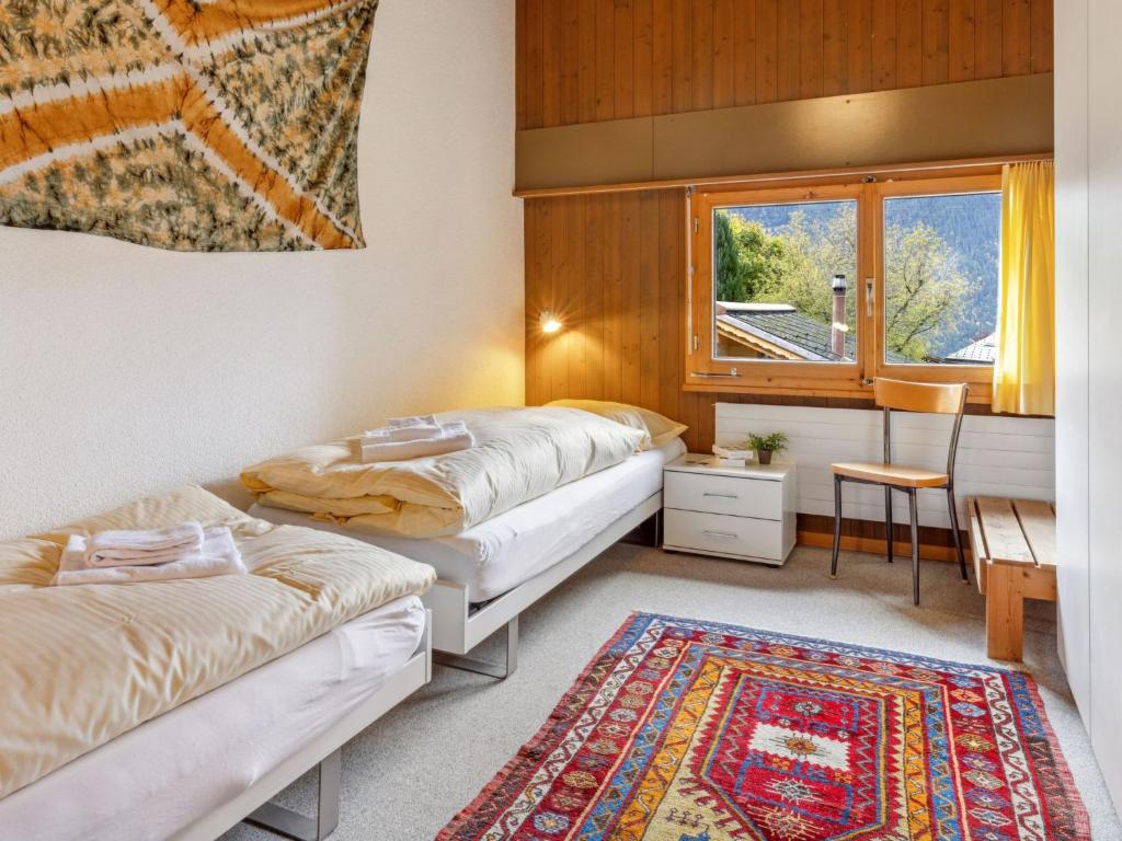 Postel nebo postele na pokoji v ubytování Apartment Bärnermutz by Interhome