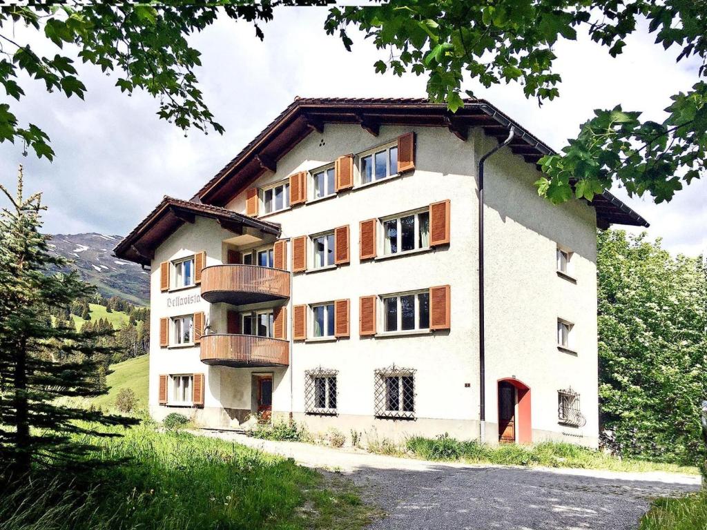 a building with balconies on the side of it at Apartment Bellavista 6 by Interhome in Parpan