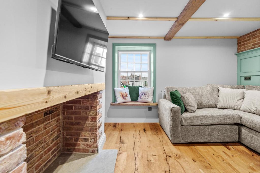 Posezení v ubytování Tilly's Cosy Cottage Retreats - Castle Cottage