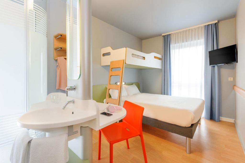 Postel nebo postele na pokoji v ubytování Ibis Budget Bamberg