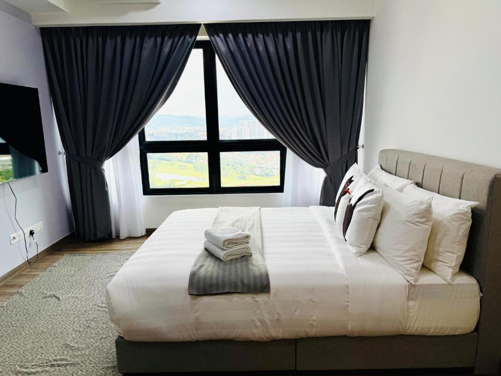 Postel nebo postele na pokoji v ubytování Agile TRX Luxury suite Bukit bintang
