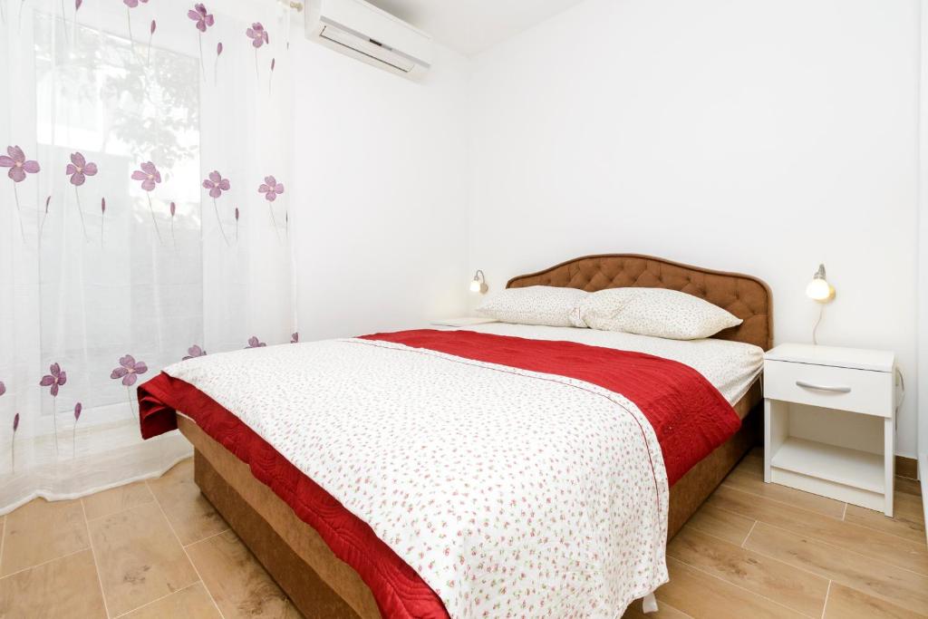 Posteľ alebo postele v izbe v ubytovaní Imperium Apartments