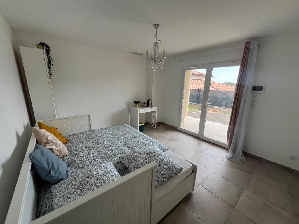 Posteľ alebo postele v izbe v ubytovaní Chambres & Suites Villa architecte