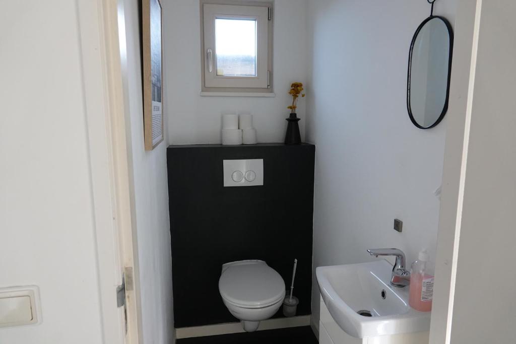 Koupelna v ubytování Vakantie huis aan het water