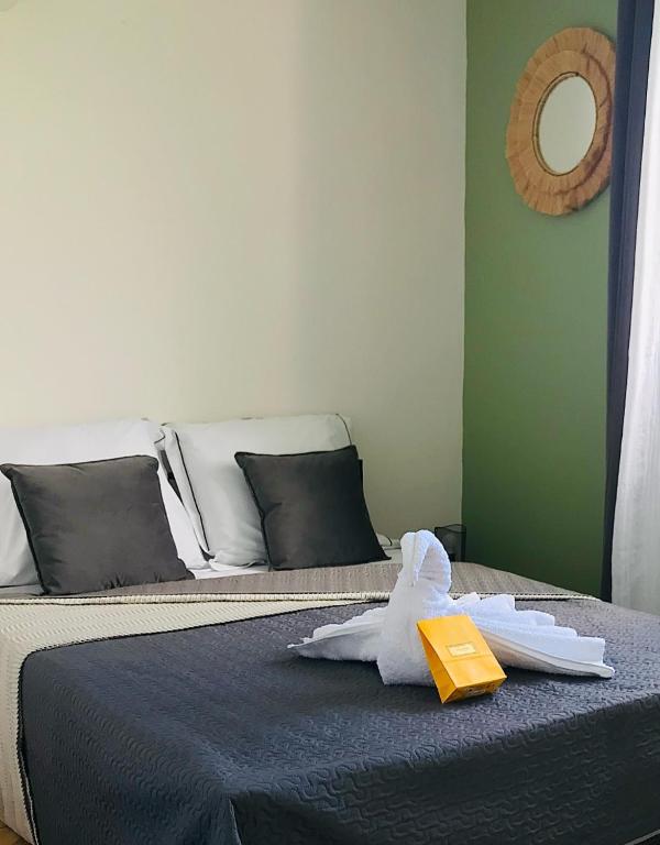 Postel nebo postele na pokoji v ubytování La Villa Didine