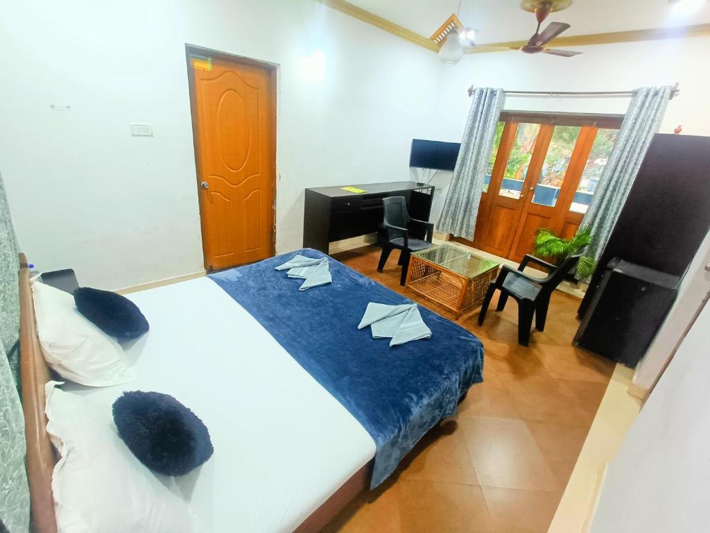Postel nebo postele na pokoji v ubytování CSG Guest House