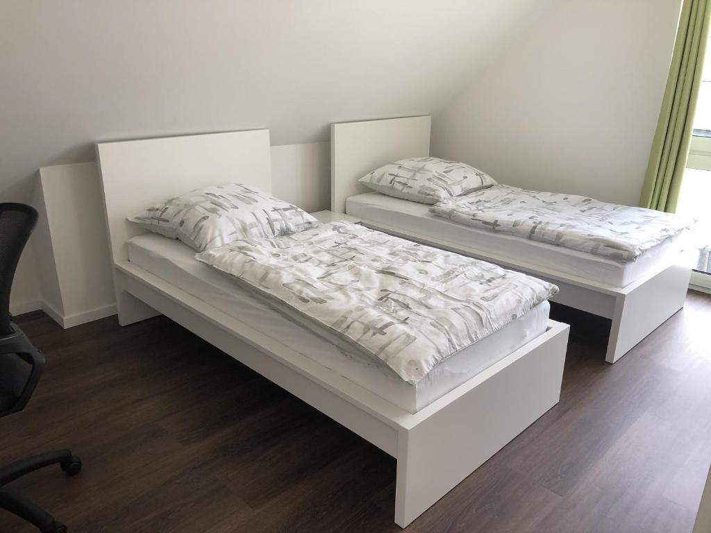 Postel nebo postele na pokoji v ubytování Gästehaus Witteborg