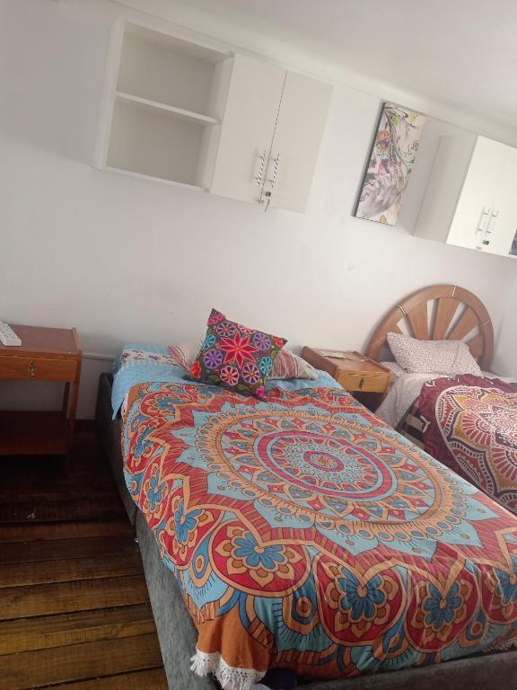 Una cama o camas en una habitación de Hostel mágico San Blas