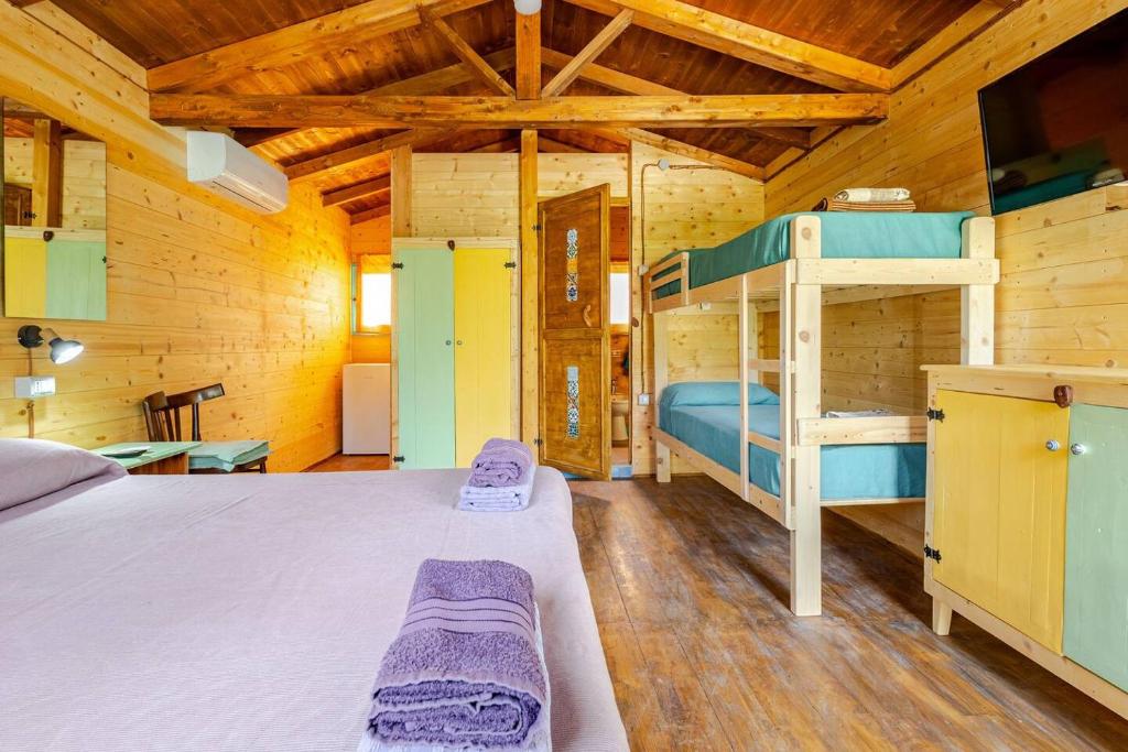 Postel nebo postele na pokoji v ubytování Masseria Usamborgia