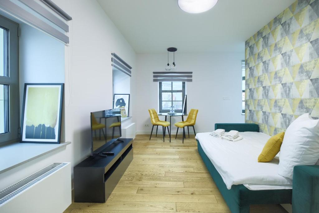 Posedenie v ubytovaní AboutArtApartments - Młyn Maria