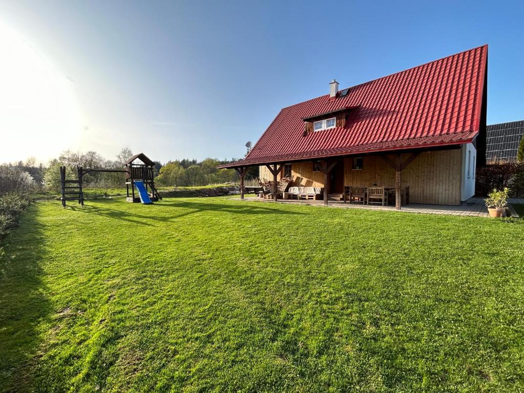 Κήπος έξω από το Holiday Home Osada