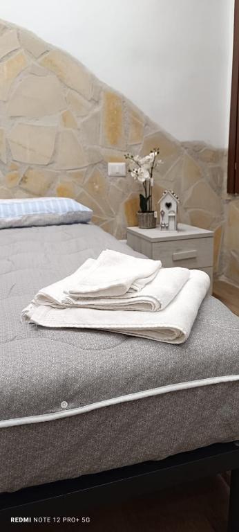 Postel nebo postele na pokoji v ubytování La Casa di Simo