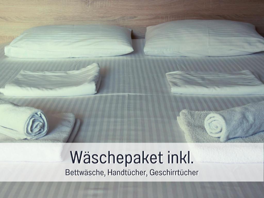 Postel nebo postele na pokoji v ubytování Ferienhaus Töpferhaus - strandnah, haustierfreundlich, optimal für Workation, Kaminofen, Garten, für Paare und Alleinreisende