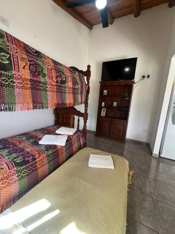 Postel nebo postele na pokoji v ubytování Las Glicinas
