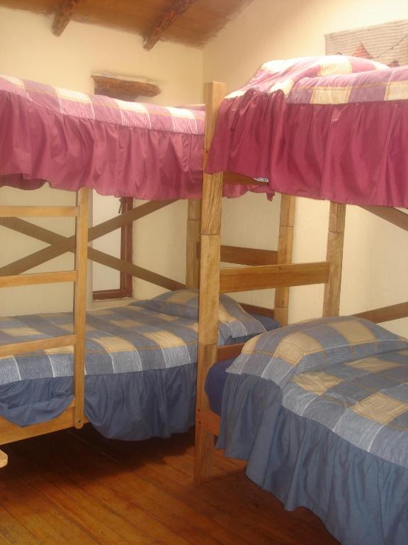 Voodi või voodid majutusasutuse Samay Wasi Hostel I toas