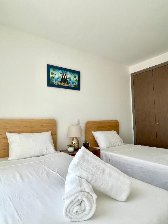 Ένα ή περισσότερα κρεβάτια σε δωμάτιο στο Skyline Suite in Polanco Best Location Fast Wifi