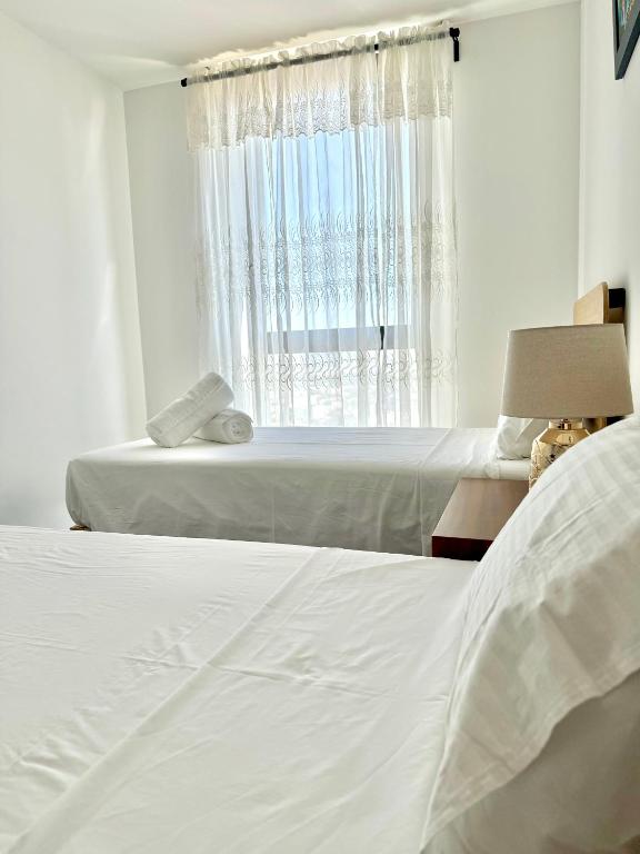 Ένα ή περισσότερα κρεβάτια σε δωμάτιο στο Skyline Suite in Polanco Best Location Fast Wifi