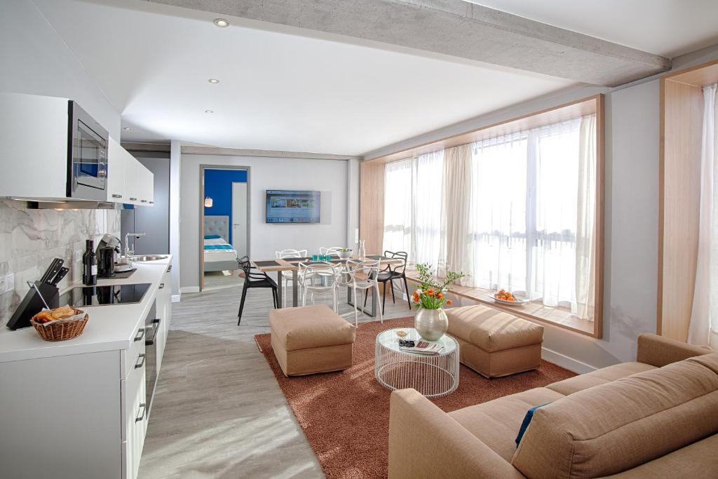 Kuchyň nebo kuchyňský kout v ubytování MLOFT Apartments München
