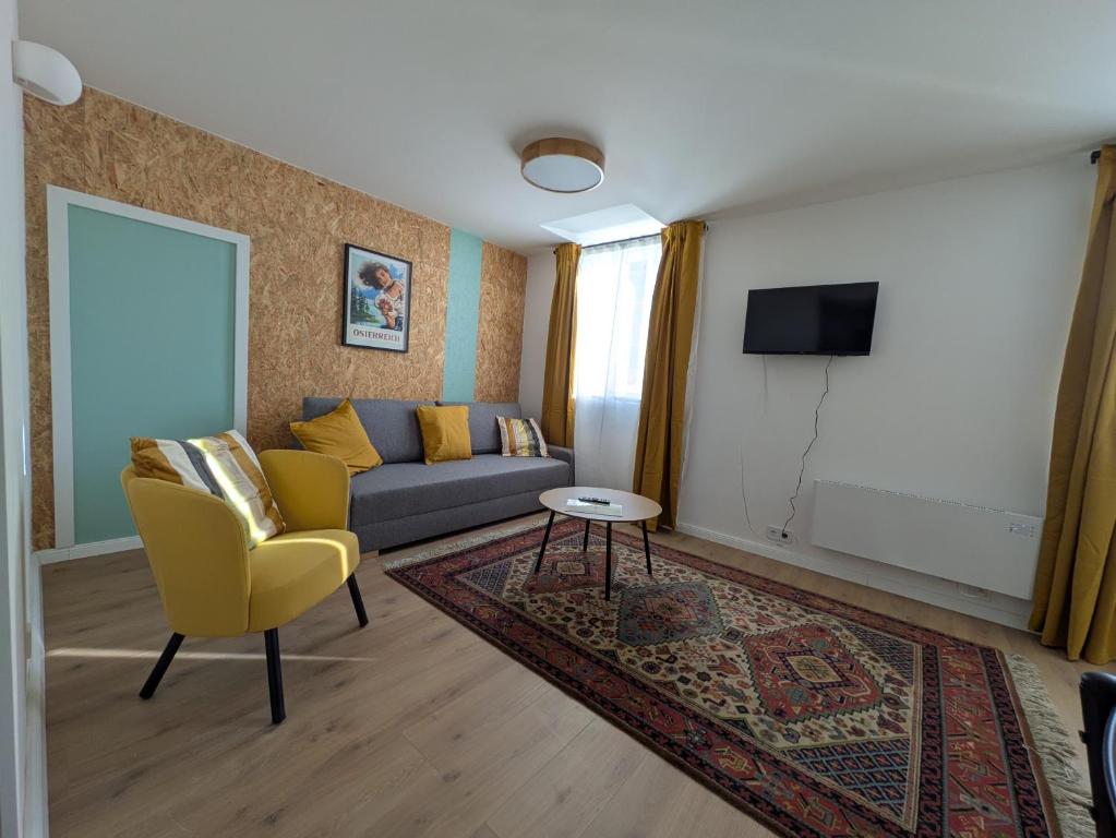 TV a/nebo společenská místnost v ubytování mg4 Apartments