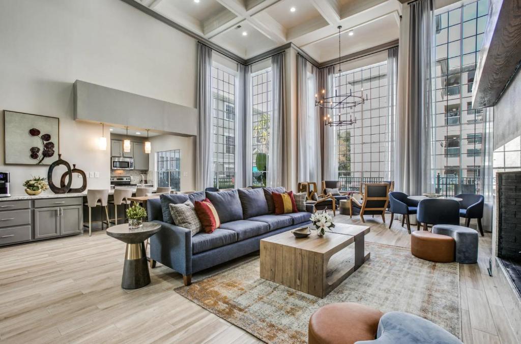 a living room with a couch and a table at Resort Style Apt/Home in Houston Medical Centre in Houston