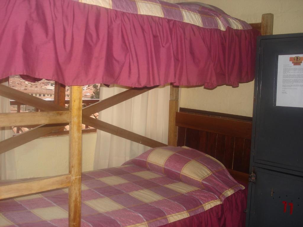Voodi või voodid majutusasutuse Samay Wasi Hostel I toas