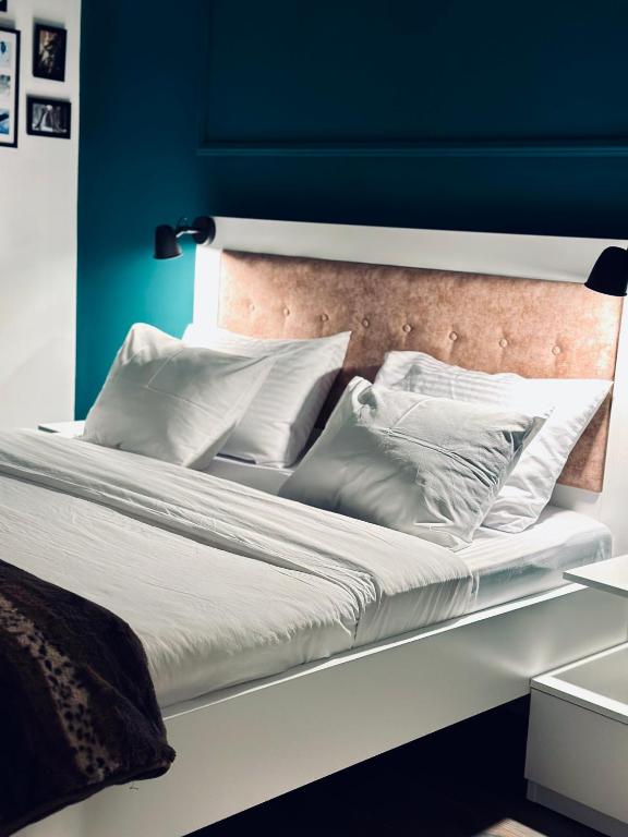 Postel nebo postele na pokoji v ubytování Apartman Viktorija