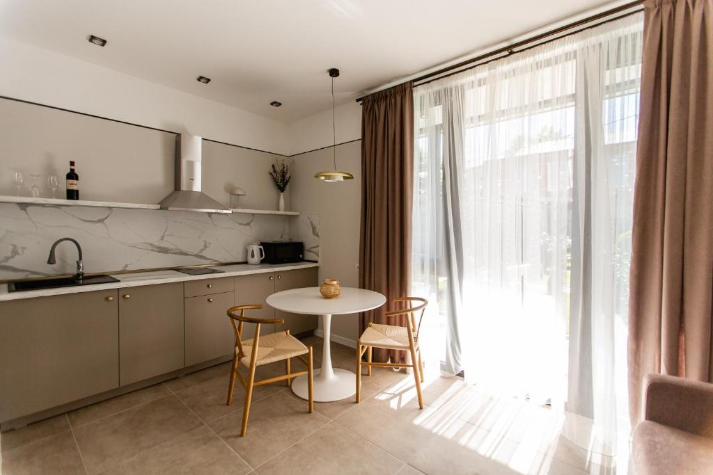 Kuchyň nebo kuchyňský kout v ubytování Central Inn