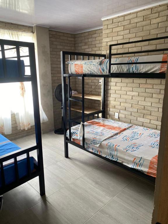 Postel nebo postele na pokoji v ubytování Rincon de charito
