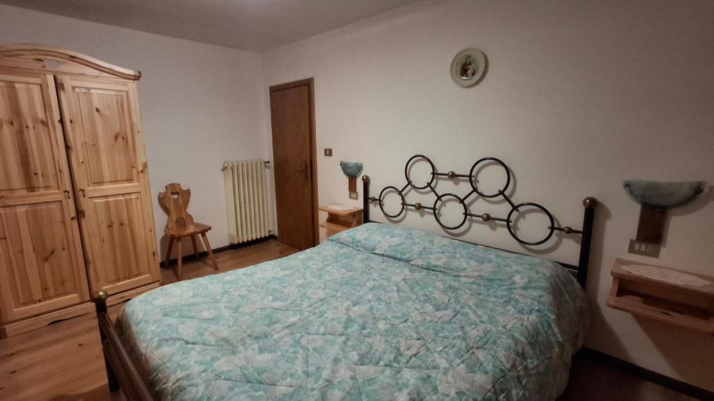 Postel nebo postele na pokoji v ubytování Residence Marmolada